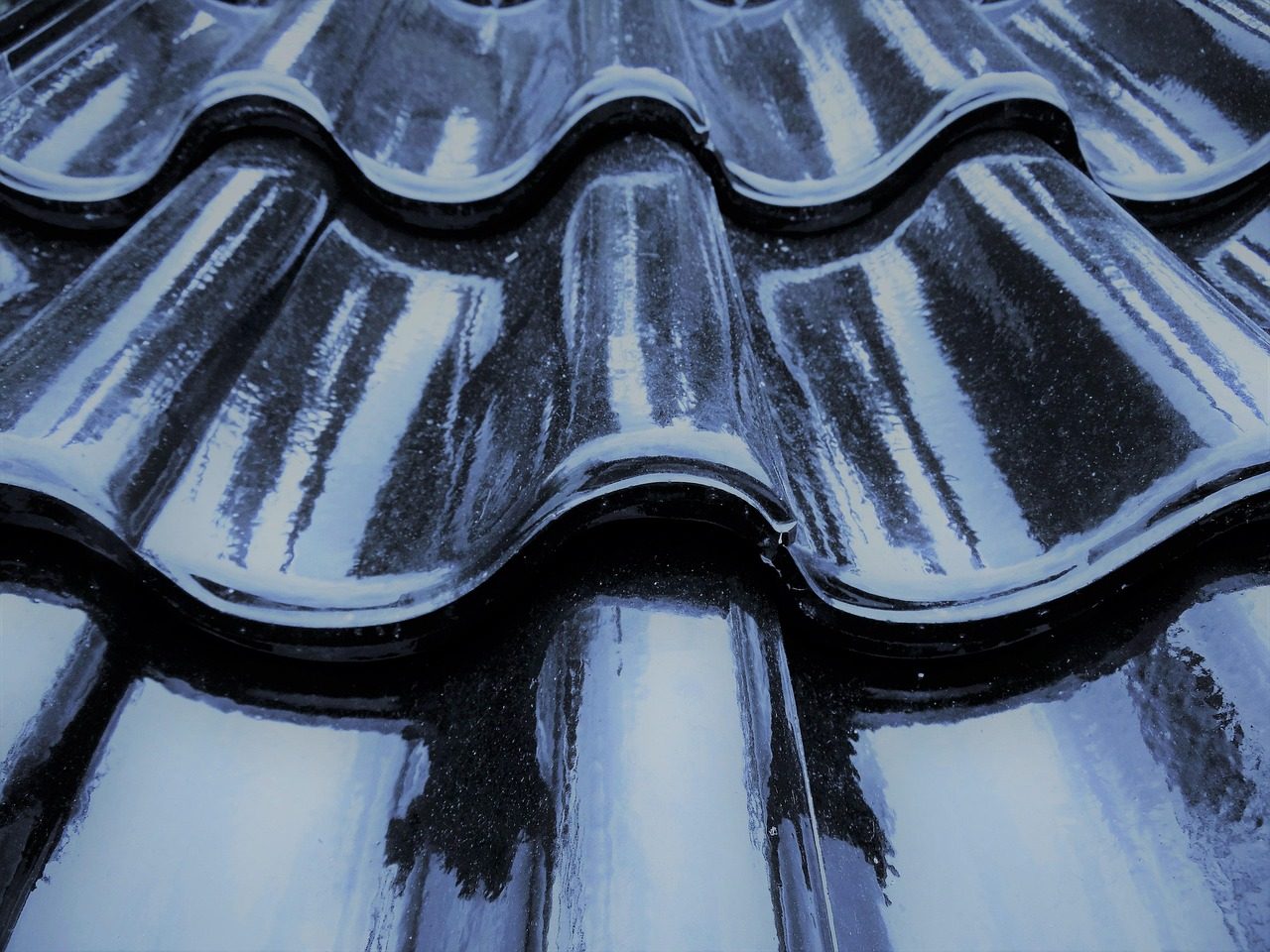Close-up of glossy glazed roof tiles
